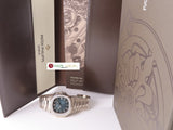 Patek Philippe Nautilus 18 ct. White Gold Original Factory Diamond Bezel Blue Dial 5713/1G December 2012 (Pre Order)